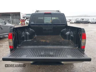 2000 Nissan Frontier XE z VIN 1N6ED27Y4YC355942, wystawiony jako IAAI lot #42162996 z przebiegiem 278 251 mil mil oraz . Historia ofert i sprzedaży dostępna na DreamBid. Obrazek 13.