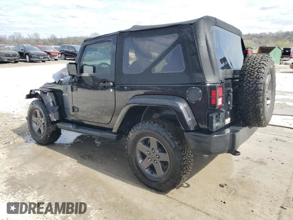 2016 Jeep Wrangler Sport with VIN 1C4AJWAG6GL196891, listed as a Copart auction lot 51148825 with 128,245 mi miles and Salvage Title. Bid and sale history available at carsss.com. Image 2.