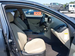 2015 Kia Optima EX z VIN KNAGN4AD8F5084764, wystawiony jako IAAI lot #42404405 z przebiegiem 158 587 mil mil oraz . Historia ofert i sprzedaży dostępna na DreamBid. Obrazek 5.