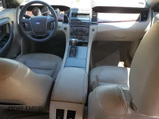 2011 Ford Taurus SEL z VIN 1FAHP2EW6BG176994, wystawiony jako Copart lot #56154735 z przebiegiem 211 017 mil mil oraz Szkoda całkowita • Salvage title. Historia ofert i sprzedaży dostępna na DreamBid. Obrazek 8.