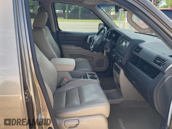 2009 Honda Ridgeline RTL with VIN 2HJYK16539H500759, listed as a Copart auction lot 63874225 with 123,508 mi miles and Clean title. Bid and sale history available at DreamBid. Image 5.
