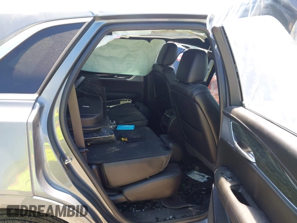 2020 Cadillac XT5 Premium Luxury FWD with VIN 1GYKNCRS3LZ131028, listed as a IAAI auction lot 42232140 with Not provided miles and . Bid and sale history available at DreamBid. Image 8.