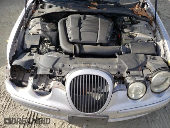 2002 Jaguar S-Type with VIN SAJDA03P22GM36867, listed as a Copart auction lot 79027454 with 52,489 mi miles and Salvage Title. Bid and sale history available at DreamBid. Image 11.