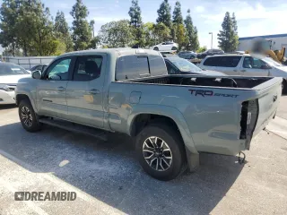2022 Toyota Tacoma SR5 with VIN 3TMBZ5DN9NM033861, listed as a Copart auction lot 53704065 with 55,386 mi miles and Salvage title. Bid and sale history available at DreamBid. Image 2.