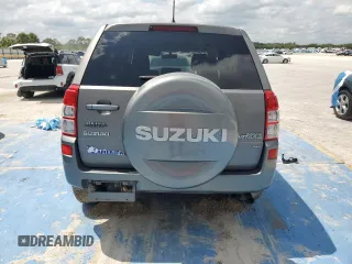 2009 Suzuki Grand Vitara with VIN JS3TD042694100821, listed as a Copart auction lot 57209065 with 89,362 mi miles and Salvage title. Bid and sale history available at DreamBid. Image 6.