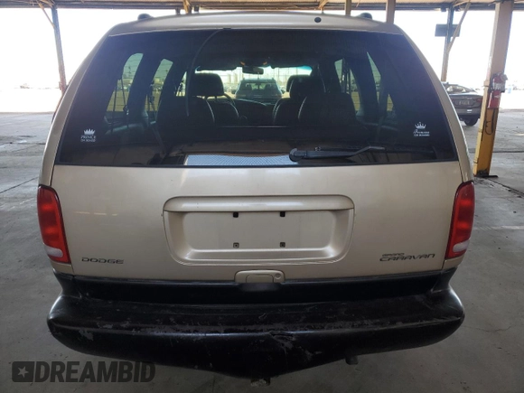1998 Dodge Caravan LE with VIN 1B4GP54LXWB743058, listed as a Copart auction lot 80271164 with 192,048 mi miles and Salvage title. Bid and sale history available at DreamBid. Image 6.