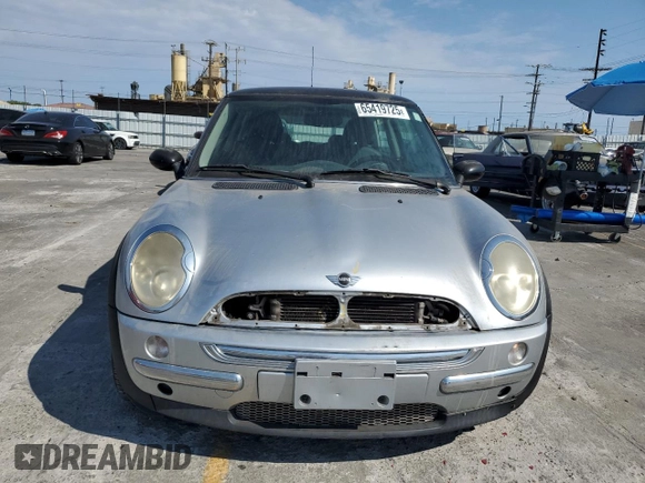 2003 MINI Hardtop with VIN WMWRC33453TE14909, listed as a Copart auction lot 65419725 with 111,960 mi miles and Salvage title. Bid and sale history available at DreamBid. Image 5.