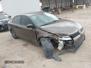 2014 Volkswagen Jetta S z VIN 3VW2K7AJ2EM428270, wystawiony jako IAAI lot #42279676 z przebiegiem 97 656 mil mil oraz . Historia ofert i sprzedaży dostępna na DreamBid. Obrazek 1.