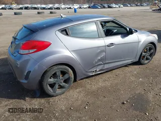 2013 Hyundai Veloster w/Black Int with VIN KMHTC6AD5DU172964, listed as a IAAI auction lot 41768827 with 102,782 mi miles and . Bid and sale history available at DreamBid. Image 4.