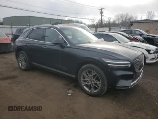 2022 Genesis GV70 2.5T z VIN KMUMADTB4NU063411, wystawiony jako Copart lot #88245785 z przebiegiem 16 290 mil mil oraz Szkoda całkowita • Salvage title. Historia ofert i sprzedaży dostępna na DreamBid. Obrazek 4.