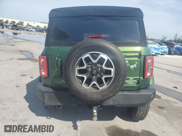 2022 Ford Bronco z VIN 1FMDE5BHXNLA88611, wystawiony jako Copart lot #58135415 z przebiegiem 15 448 mil mil oraz Nie do naprawy • Non repairable. Historia ofert i sprzedaży dostępna na DreamBid. Obrazek 6.
