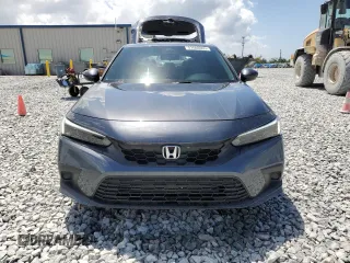 2023 Honda Civic EX-L z VIN 19XFL1H72PE010913, wystawiony jako Copart lot #51608005 z przebiegiem 35 961 mil mil oraz Szkoda całkowita • Salvage title. Historia ofert i sprzedaży dostępna na DreamBid. Obrazek 5.
