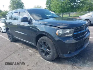 2013 Dodge Durango Crew with VIN 1C4RDJDG8DC675558, listed as a IAAI auction lot 42466777 with 160,407 mi miles and . Bid and sale history available at DreamBid. Image 1.