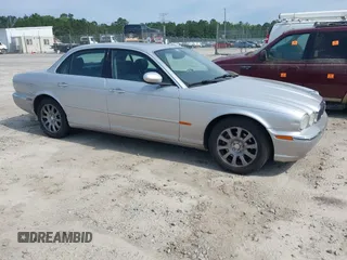 2004 Jaguar XJ 8 z VIN SAJWA71C24SG32778, wystawiony jako IAAI lot #42265164 z przebiegiem 155 872 mil mil oraz . Historia ofert i sprzedaży dostępna na DreamBid. Obrazek 1.