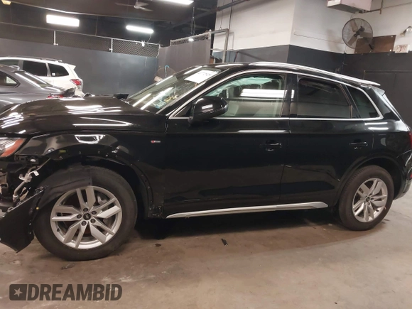 2022 Audi Q5 S line Premium z VIN WA1GAAFY2N2049219, wystawiony jako IAAI lot #41772929 z przebiegiem 17 625 mil mil oraz . Historia ofert i sprzedaży dostępna na DreamBid. Obrazek 14.
