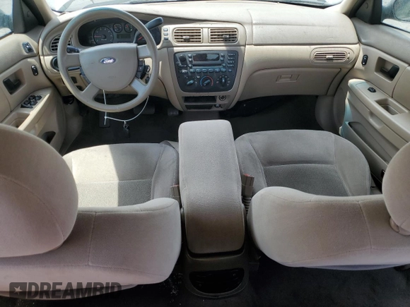 2007 Ford Taurus SE with VIN 1FAFP53U27A156844, listed as a Copart auction lot 59204695 with 157,633 mi miles and Salvage title. Bid and sale history available at DreamBid. Image 8.