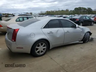 2009 Cadillac CTS RWD w/1SA with VIN 1G6DF577590150928, listed as a Copart auction lot 75338354 with 127,997 mi miles and Salvage Title. Bid and sale history available at carsss.com. Image 3.