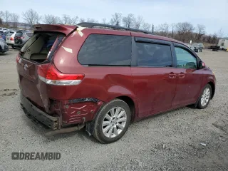 2012 Toyota Sienna XLE with VIN 5TDDK3DC2CS048425, listed as a Copart auction lot 48847955 with 165,631 mi miles and Salvage Title. Bid and sale history available at carsss.com. Image 3.