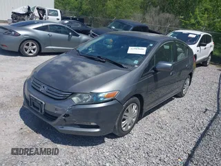 2010 Honda Insight LX with VIN JHMZE2H56AS002473, listed as a IAAI auction lot 41983606 with Not Provided miles and . Bid and sale history available at DreamBid. Image 2.