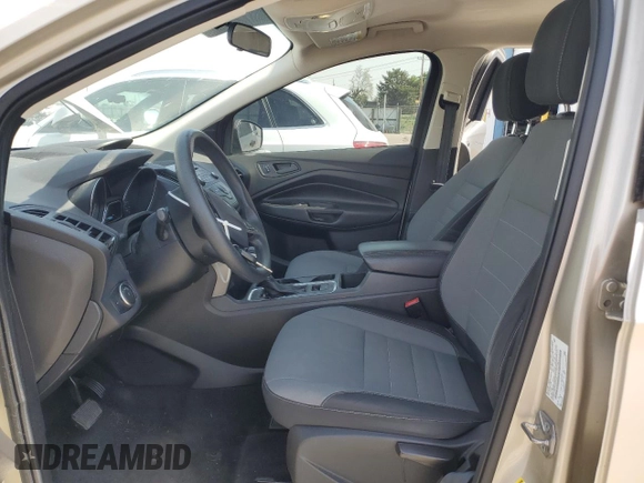 2017 Ford Escape S with VIN 1FMCU0F77HUE25995, listed as a Copart auction lot 56180845 with 105,006 mi miles and Salvage title. Bid and sale history available at DreamBid. Image 7.