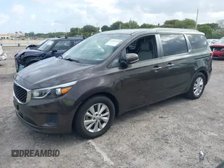 2018 Kia Sedona LX with VIN KNDMB5C15J6382599, listed as a IAAI auction lot 41964769 with 82,494 mi miles. Bid and sale history available at carsss.com. Image 2.