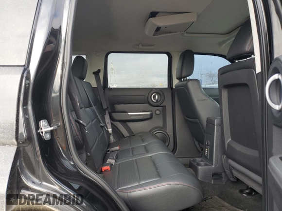 2008 Dodge Nitro R/T with VIN 1D8GU58618W245621, listed as a Copart auction lot 77798384 with 151,784 mi miles and Salvage Title. Bid and sale history available at DreamBid. Image 11.