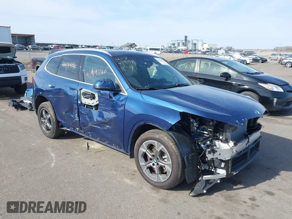 2025 BMW X1 xDrive28i z VIN WBX73EF01S5110817, wystawiony jako IAAI lot #41991160 z przebiegiem 1 287 mil mil oraz . Historia ofert i sprzedaży dostępna na DreamBid. Obrazek 1.