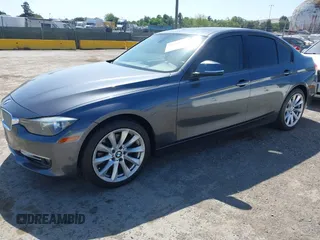 2012 BMW 3 Series 328i with VIN WBA3A5C5XCF342956, listed as a IAAI auction lot 42167647 with 154,972 mi miles and . Bid and sale history available at carsss.com. Image 2.