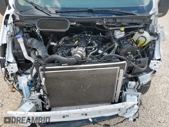 2023 Ford Transit Cargo с VIN 1FTRU8XG2PKB03545, выставлен на аукционе Copart как лот 57811895 с пробегом 29 474 миль миль и Списание • Salvage title. История ставок и продаж доступна на DreamBid. Изображение 12.