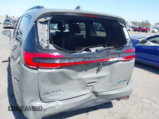 2021 Chrysler Pacifica Hybrid Limited z VIN 2C4RC1S76MR544495, wystawiony jako IAAI lot #42294312 z przebiegiem 89 083 mil mil oraz . Historia ofert i sprzedaży dostępna na DreamBid. Obrazek 6.