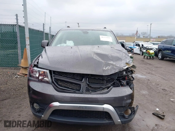 2020 Dodge Journey Crossroad z VIN 3C4PDCGB4LT271100, wystawiony jako IAAI lot #41552975 z przebiegiem 74 400 mil mil oraz . Historia ofert i sprzedaży dostępna na DreamBid. Obrazek 6.