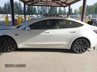 2020 Tesla Model 3 Performance z VIN 5YJ3E1EC2LF624900, wystawiony jako IAAI lot #42127589 z przebiegiem 36 758 mil mil oraz . Historia ofert i sprzedaży dostępna na DreamBid. Obrazek 14.
