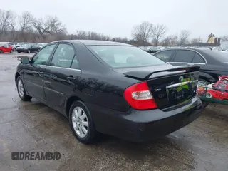 2004 Toyota Camry LE with VIN 4T1BF32K84U074364, listed as a IAAI auction lot 41479264 with 265,865 mi miles. Bid and sale history available at carsss.com. Image 3.