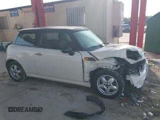 2011 MINI Hardtop with VIN WMWSU3C5XBT095591, listed as a IAAI auction lot 42366393 with 99,092 mi miles and . Bid and sale history available at DreamBid. Image 13.