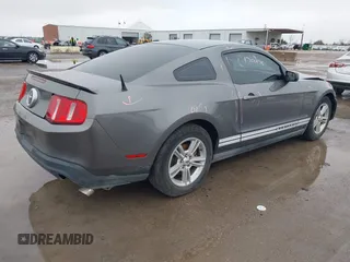 2011 Ford Mustang V6 with VIN 1ZVBP8AM2B5125492, listed as a IAAI auction lot 41565388 with 135,688 mi miles and . Bid and sale history available at carsss.com. Image 4.