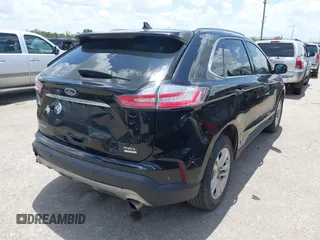 2020 Ford Edge SEL with VIN 2FMPK3J99LBA59621, listed as a IAAI auction lot 42513247 with 163,466 mi miles and . Bid and sale history available at DreamBid. Image 4.