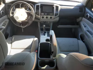 2010 Toyota Tacoma PreRunner with VIN 3TMKU4HN3AM025218, listed as a Copart auction lot 87600035 with 92,605 mi miles and Salvage title. Bid and sale history available at DreamBid. Image 8.