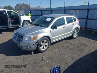 2011 Dodge Caliber Mainstreet with VIN 1B3CB3HA0BD255251, listed as a IAAI auction lot 41699098 with 166,550 mi miles. Bid and sale history available at carsss.com. Image 2.
