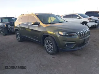 2019 Jeep Cherokee Latitude Plus with VIN 1C4PJLLN0KD164168, listed as a IAAI auction lot 41197248 with 118,278 mi miles. Bid and sale history available at carsss.com. Image 1.