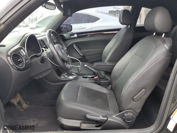 2013 Volkswagen Beetle Coupe 2.5L with VIN 3VWJP7AT8DM664287, listed as a Copart auction lot 46989865 with 124,974 mi miles and Salvage Title. Bid and sale history available at carsss.com. Image 7.
