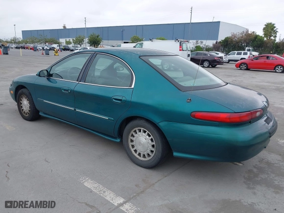 1996 Mercury Sable LS with VIN 1MELM53S0TG600877, listed as a IAAI auction lot 42063937 with 200,405 mi miles. Bid and sale history available at carsss.com. Image 3.
