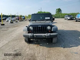 2009 Jeep Wrangler X with VIN 1J4FA24159L772540, listed as a Copart auction lot 62183815 with 179,628 mi miles and Salvage title. Bid and sale history available at DreamBid. Image 14.