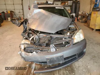 2006 Mitsubishi Lancer ES z VIN JA3AJ26EX6U067642, wystawiony jako Copart lot #51628485 z przebiegiem 163 060 mil mil oraz Szkoda całkowita • Salvage title. Historia ofert i sprzedaży dostępna na DreamBid. Obrazek 5.