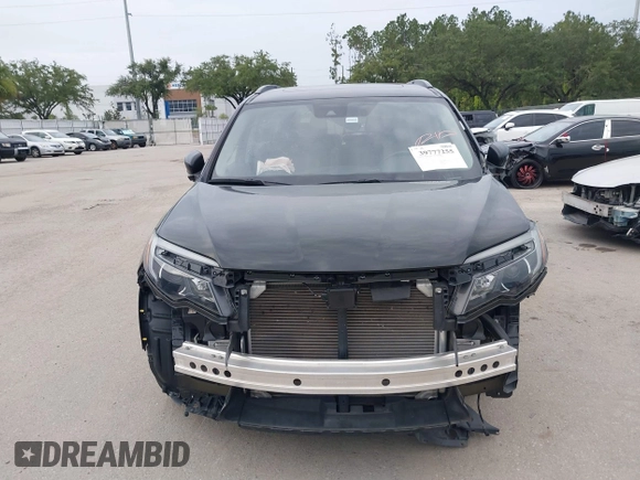 2021 Honda Pilot Special Edition with VIN 5FNYF5H27MB043732, listed as a IAAI auction lot 39777255 with 56,087 mi miles and . Bid and sale history available at DreamBid. Image 12.