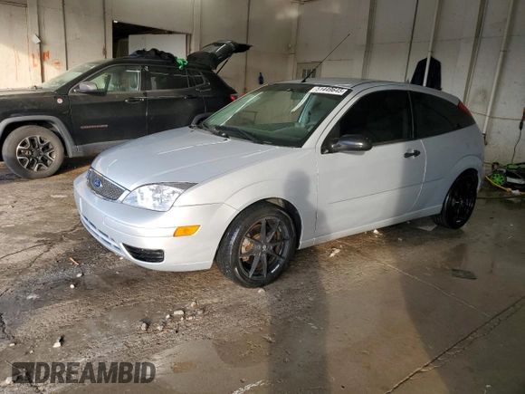2007 Ford Focus S with VIN 1FAFP31N47W129857, listed as a Copart auction lot 51449645 with 146,360 mi miles and Salvage Title. Bid and sale history available at DreamBid. Image 1.