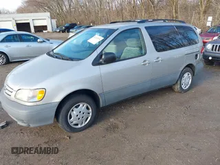 2003 Toyota Sienna CE with VIN 4T3ZF19C33U553315, listed as a IAAI auction lot 41212999 with 274,331 mi miles. Bid and sale history available at carsss.com. Image 2.