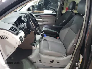 2011 Volkswagen Routan SE with VIN 2V4RW3DG2BR738704, listed as a Copart auction lot 58767625 with 116,886 mi miles and Salvage title. Bid and sale history available at DreamBid. Image 7.