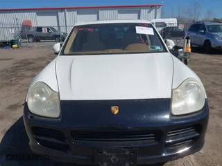 2006 Porsche Cayenne Turbo with VIN WP1AC29P06LA91297, listed as a IAAI auction lot 42067712 with 161,348 mi miles. Bid and sale history available at carsss.com. Image 12.