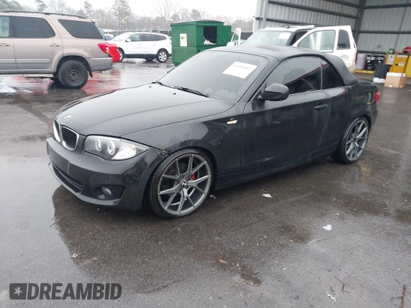 2012 BMW 1 Series 128i with VIN WBAUN1C51CVH84311, listed as a IAAI auction lot 41551912 with 147,052 mi miles and . Bid and sale history available at DreamBid. Image 2.