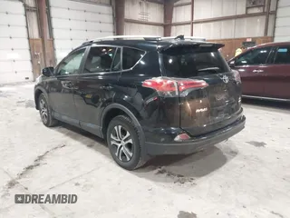 2017 Toyota RAV4 LE with VIN 2T3BFREV8HW571887, listed as a IAAI auction lot 41612815 with 100,742 mi miles and . Bid and sale history available at DreamBid. Image 3.